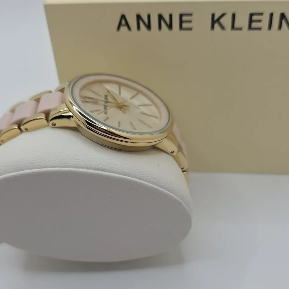 Anne Klein Women’s Analog Watch Pink Dial Gold-Tone Bracelet Roman Numerals Box